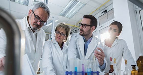 Group of lab techs talking